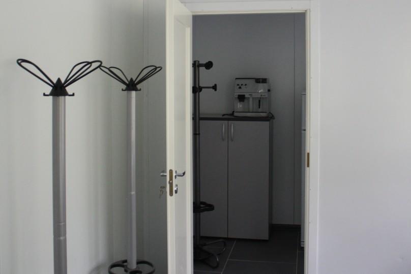 Entrance to the utility room and the kitchen
