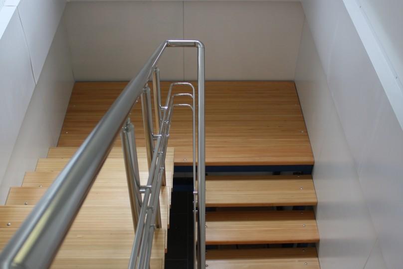 Stainless steel handrails on the stairs to the second floor