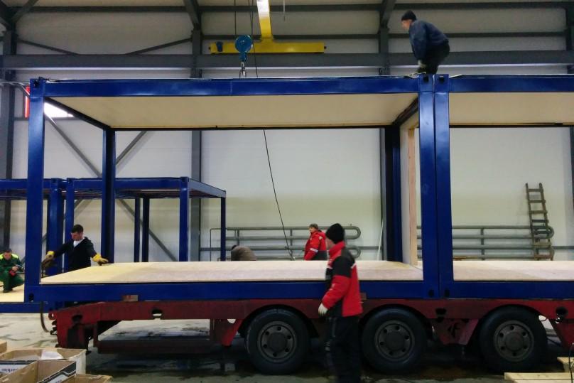 And the second module is loaded onto the truck platform