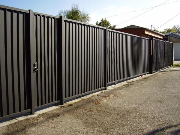 Фото Sectional fence covered trapezoidal sheet