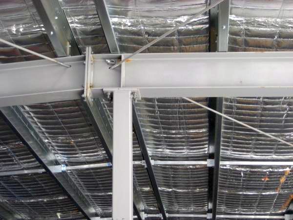 Фото The beams of the roof of the storage