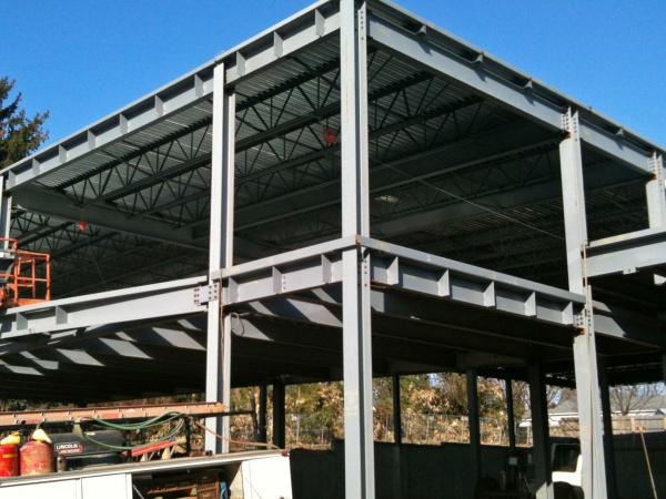 Фото The two-story building with a warehouse