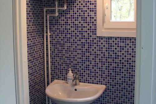 Фото The bathroom tile finishing