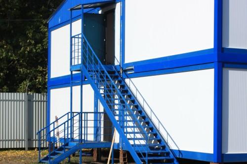 Фото Exterior stairs with a an entrance group of the first floor