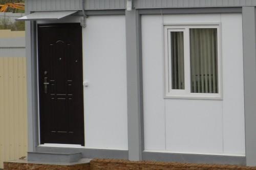 Фото Canopy made of sheet metal and an entrance stair