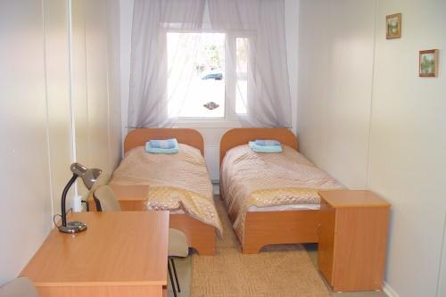 Фото 
A room in a dormitory with bunk beds